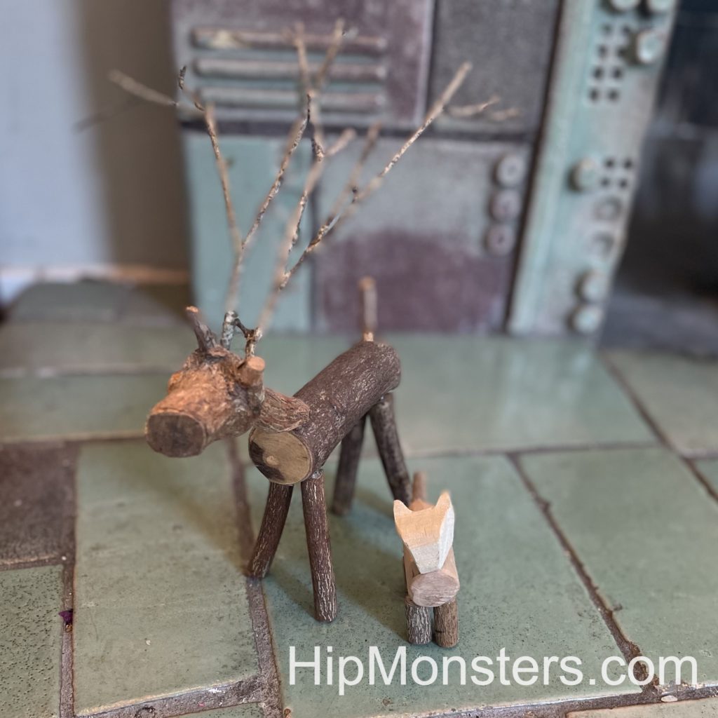 Wooden toy cat and deer
